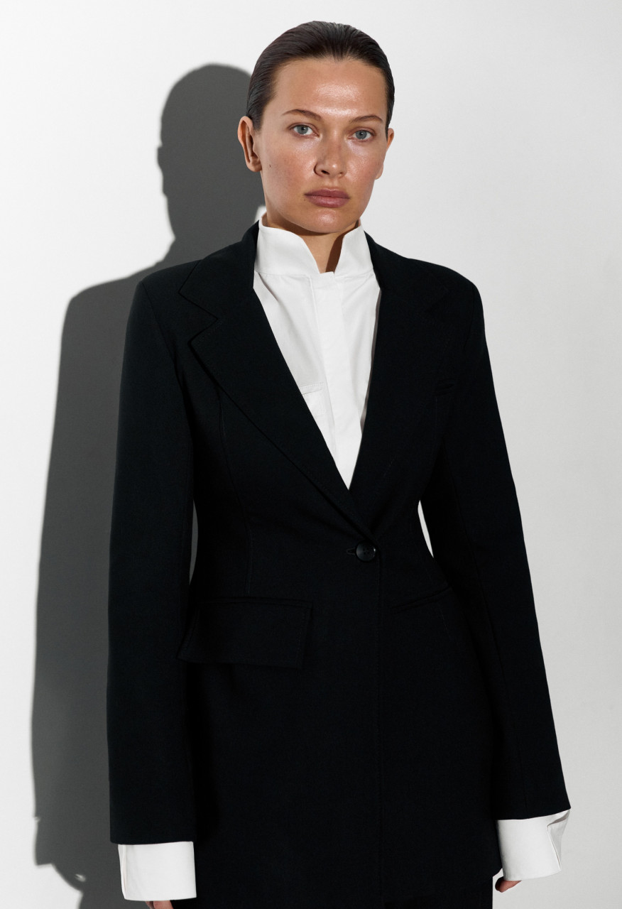 Accented waist suit